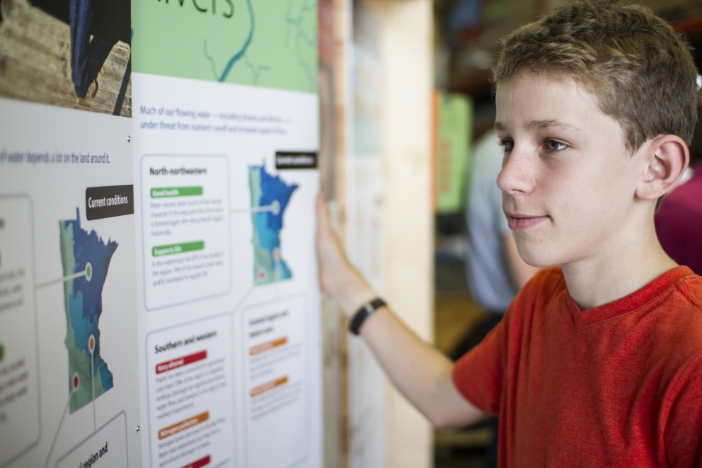 Young teen at WaterWays exhibit