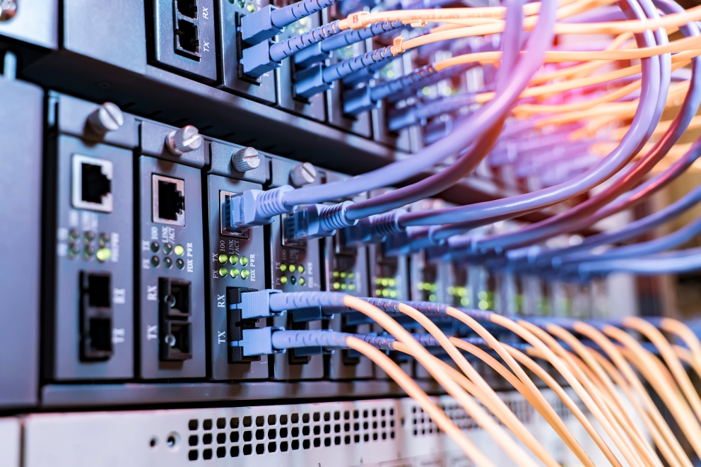 Data center server rack with fiber optic cables