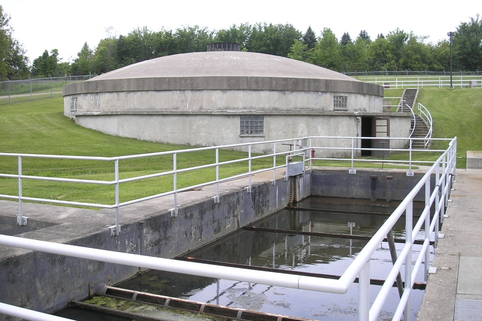 Water in rectangular basin outside of wastewater treatment facility