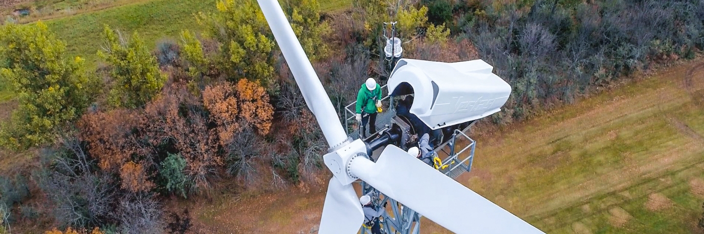 Workers servicing a wind turbine.