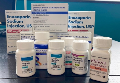 Bottles and boxes of a variety of prescription medications.