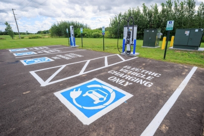 Parking lot with electric vehicles charging stations.