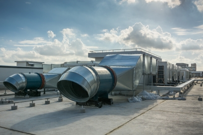 Large air control system on roof of a business.