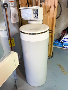 An older model water softener.