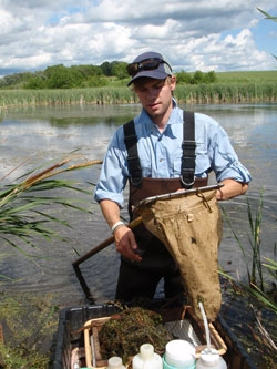 MPCA biologist collects insects in a depressional wetland in Mahnomen County.