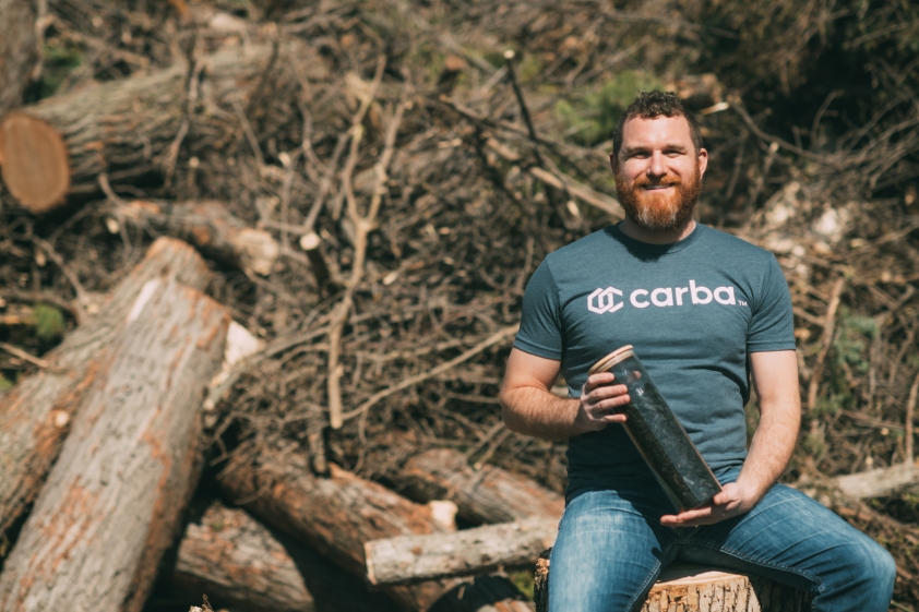 Andrew Jones of Carba with a container of char.