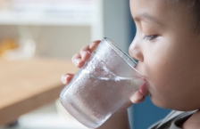 boy drinking glass of water