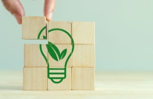 Wooden blocks with sustainable lightbulb icon printed on them