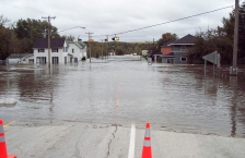 Main street of a small town completely flooded with water. 
