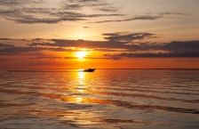 Fishing boat on Upper Red Lake in northern Minnesota at sunset.