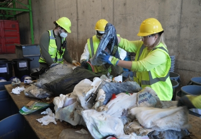Different waste types are sorted by category as part of a waste sort at Ramsey/Washington Recycling & Energy Center