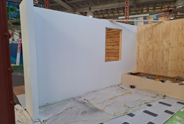Half wall and flooring for reuse room exhibit at the Minnesota State Fair