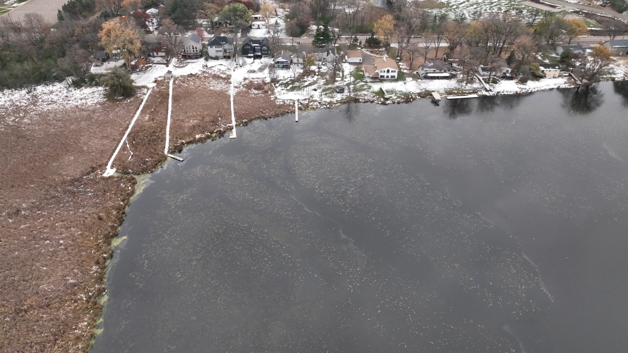 Remnants of the channels cut through the pondweed at Kohlman Lake are visible even after boating season has ended.