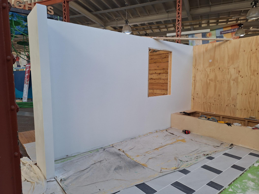 Half wall and flooring for reuse room exhibit at the Minnesota State Fair