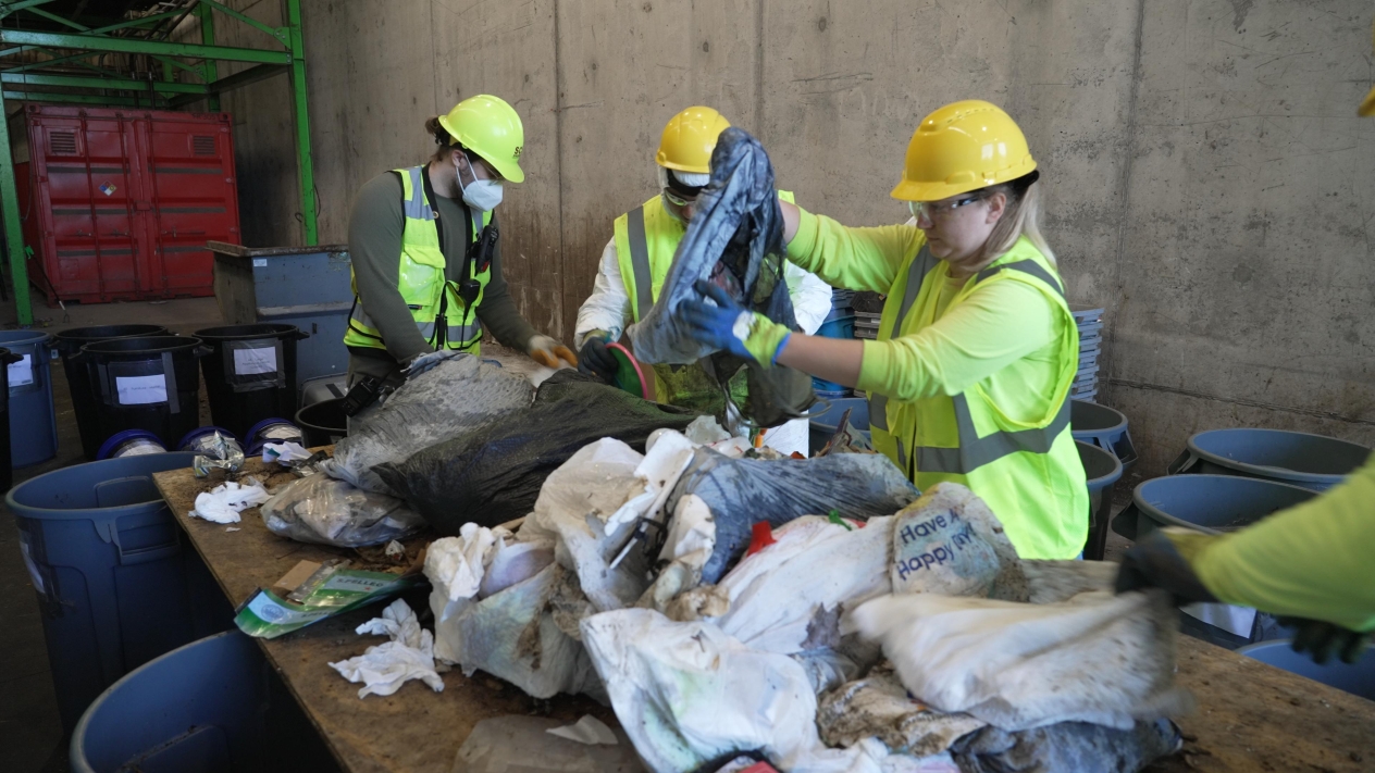Different waste types are sorted by category as part of a waste sort at Ramsey/Washington Recycling & Energy Center
