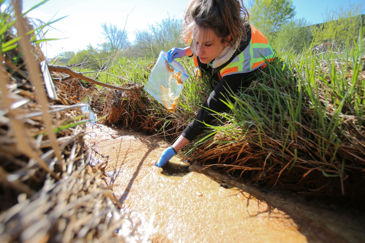 Collecting water samples for PFAS analysis in Oakdale, MN